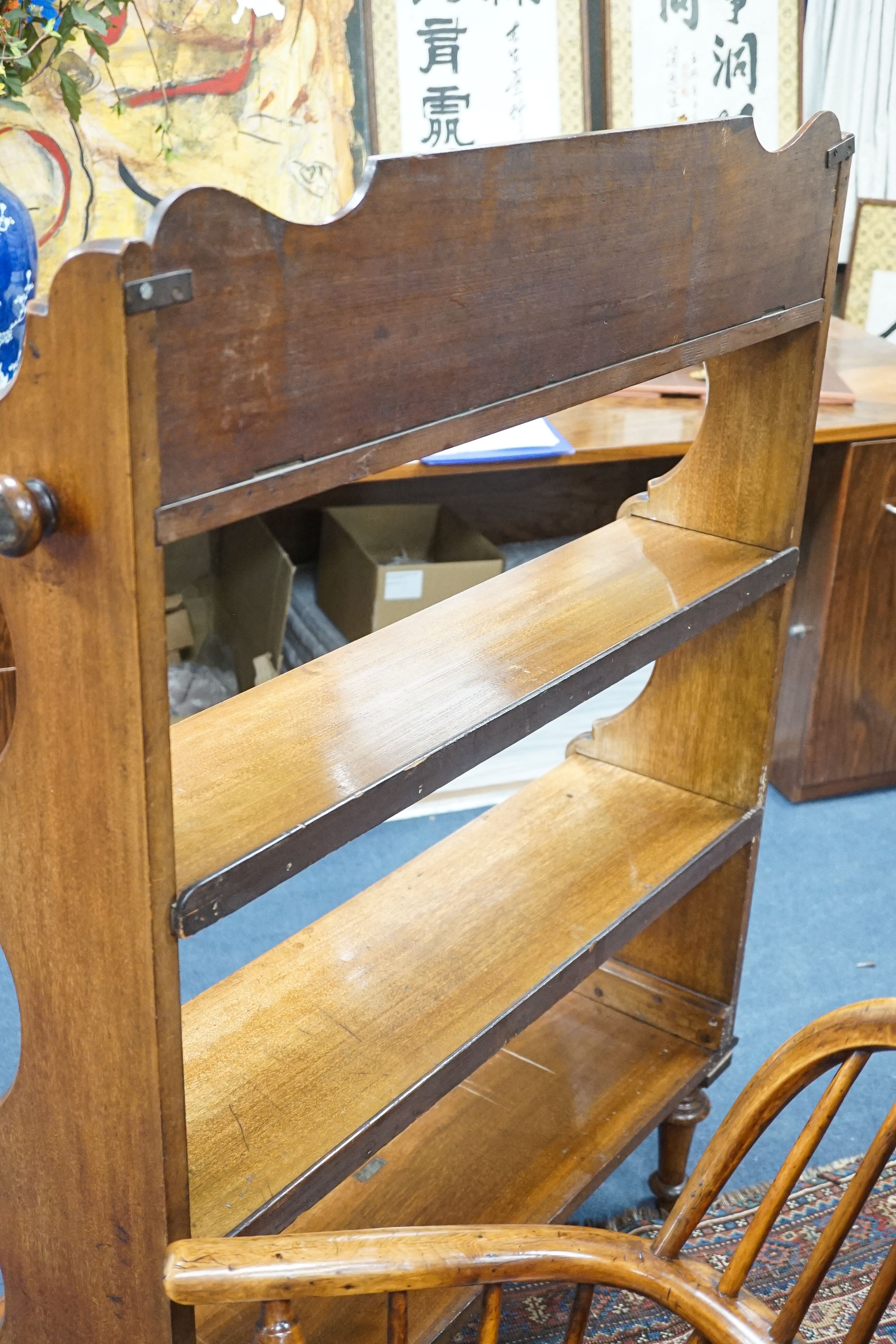 A late 19th century mahogany campaign four tier open bookcase by Ross and Co. Dublin, width 98cm, depth 37cm, height 133cm